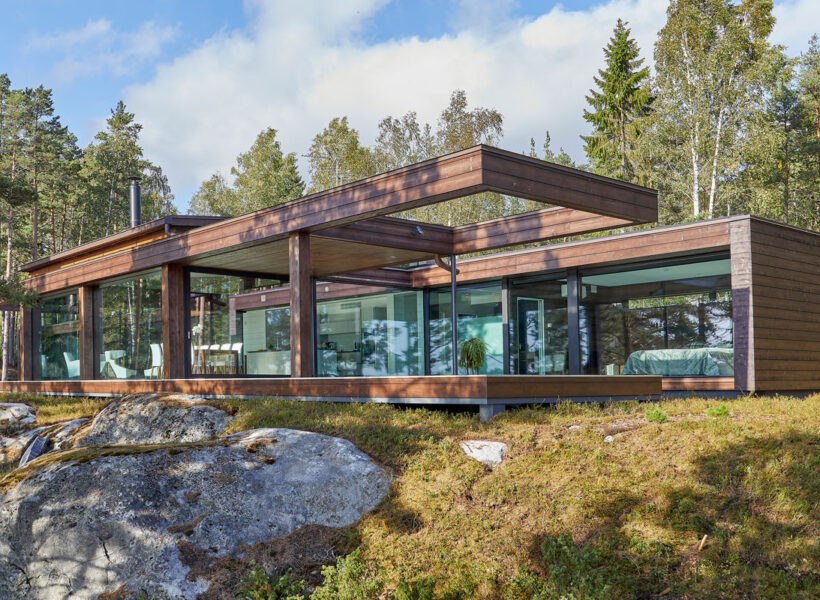 arkkitehdin suunnittelema moderni hirsitalo Luoto